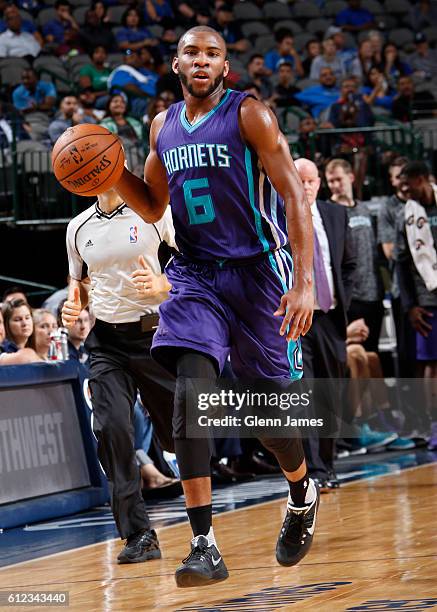 Rasheed Sulaimon of the Charlotte Hornets handles the ball against the Dallas Mavericks on October 3, 2016 at the American Airlines Center in Dallas,...