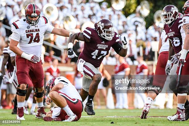 Mississippi State Bulldogs defensive lineman A.J. Jefferson celebrates after recording a sack of South Carolina Gamecocks quarterback Perry Orth...