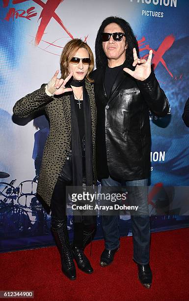 Yoshiki and Gene Simmons attend the Premiere of Drafthouse Films' 'We Are X' at TCL Chinese Theatre on October 3, 2016 in Hollywood, California.