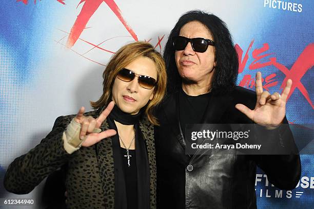 Yoshiki and Gene Simmons attend the Premiere of Drafthouse Films' 'We Are X' at TCL Chinese Theatre on October 3, 2016 in Hollywood, California.