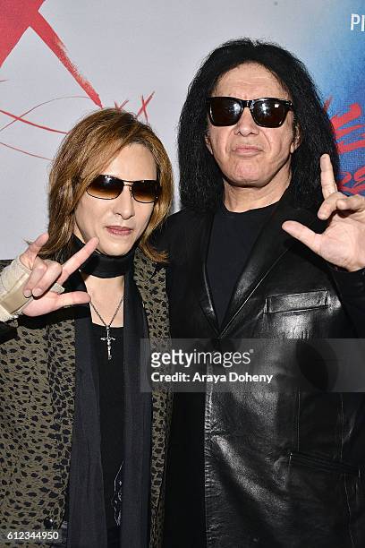 Yoshiki and Gene Simmons attend the Premiere of Drafthouse Films' 'We Are X' at TCL Chinese Theatre on October 3, 2016 in Hollywood, California.