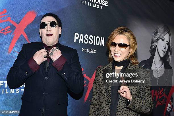 Marilyn Manson and Yoshiki attend the Premiere of Drafthouse Films' 'We Are X' at TCL Chinese Theatre on October 3, 2016 in Hollywood, California.