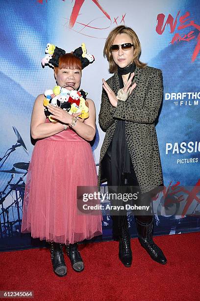Yuko Yamaguchi and Yoshiki attend the Premiere of Drafthouse Films' 'We Are X' at TCL Chinese Theatre on October 3, 2016 in Hollywood, California.