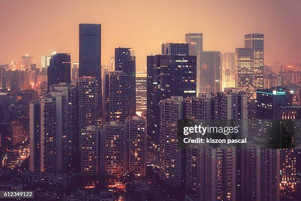 skyline of a big city in china in night - chengdu skyline stock pictures, royalty-free photos & images