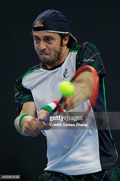 Paolo Lorenzi of Italy returns a shot against Rafael Nadal of Spain during the Men's singles second round match on day four of the 2016 China Open at...