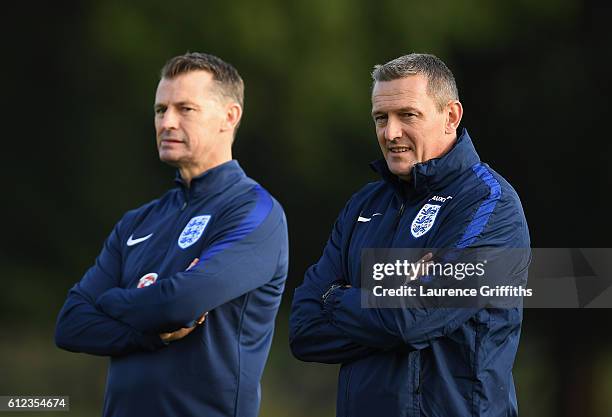 Aidy Boothroyd of England U-21 looks on with Colin Cooper during a training session at St Georges Park on October 4, 2016 in Burton-upon-Trent,...