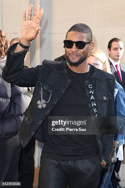 Usher arrives at the Chanel show as part of the Paris Fashion Week Womenswear Spring/Summer 2017 on October 4, 2016 in Paris, France.