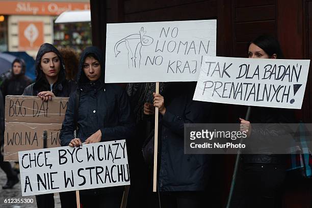 Pro-Choice protesters on Debnicki Square in Krakow, as thousands of women protested today in Krakow city center during a 'Black protest'. Women...