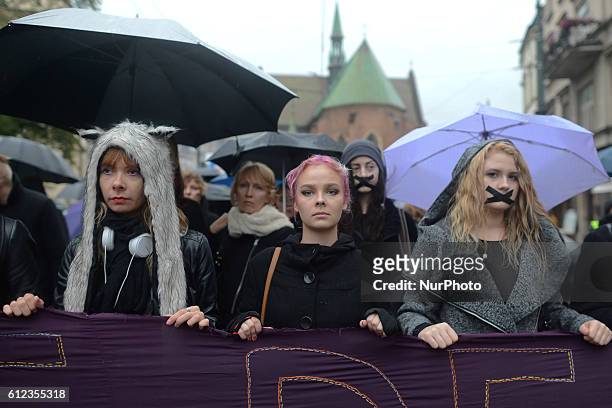 Pro-Choice protesters in Krakow Main Square, as thousands of women protested today in Krakow city center during a 'Black protest'. Women nationwide...