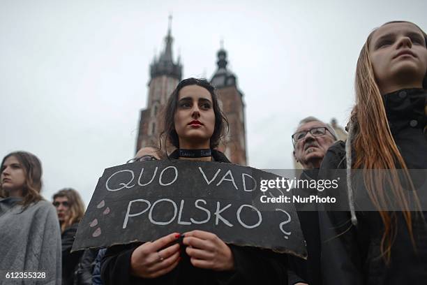 Pro-Choice protester in Krakow Main Square, as thousands of women protested today in Krakow city center during a 'Black protest'. Women nationwide...