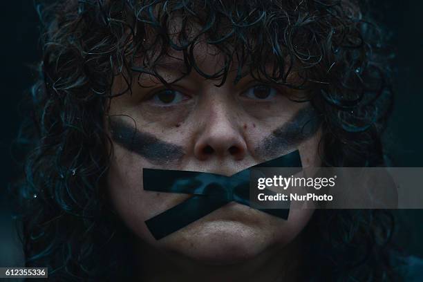 Pro-Choice protester in Krakow Main Square, as thousands of women protested today in Krakow city center during a 'Black protest'. Women nationwide...