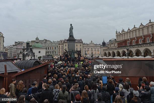 Pro-Choice protesters in Krakow Main Square, as thousands of women protested today in Krakow city center during a 'Black protest'. Women nationwide...