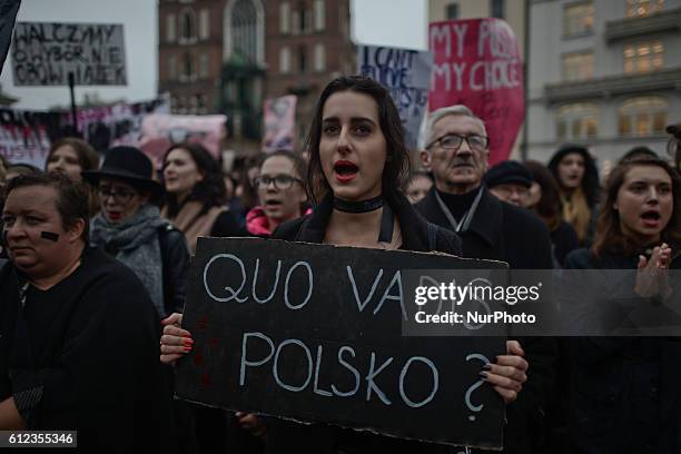 Pro-Choice protesters with 'Where are you going Poland' panel, in Krakow Main Square, as thousands of women protested today in Krakow city center...