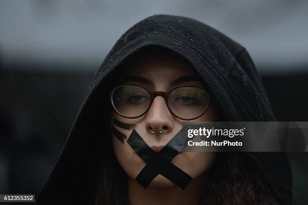 Pro-Choice protester in Krakow Main Square, as thousands of women protested today in Krakow city center during a 'Black protest'. Women nationwide...