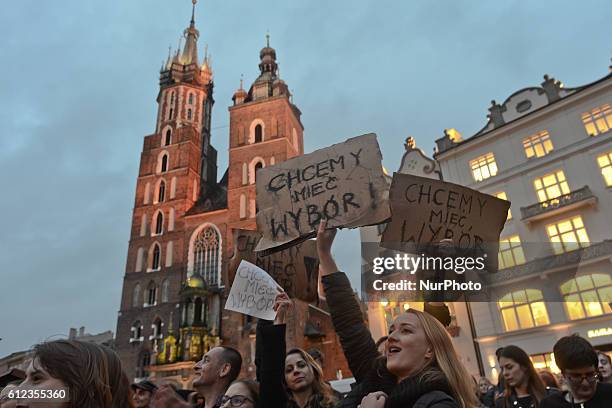 Pro-Choice protesters in Krakow Main Square, as thousands of women protested today in Krakow city center during a 'Black protest'. Women nationwide...