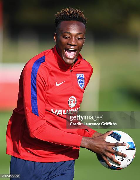 Tammy Abraham of England U-21 is all smiles during a training session at St Georges Park on October 4, 2016 in Burton-upon-Trent, England.