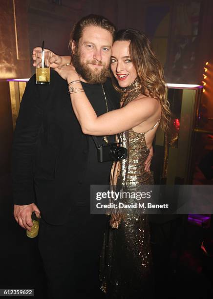 Greg Williams and Alice Temperley attend the L'Oreal Paris Gold Obsession Party at Hotel de la Monnaie on October 2, 2016 in Paris, France.