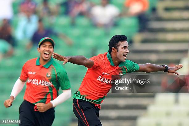 Cricketer Ebadat Hossain celebrates the dismissal of England cricketer Jason Roy during the warm-up cricket match between England and Bangladesh...