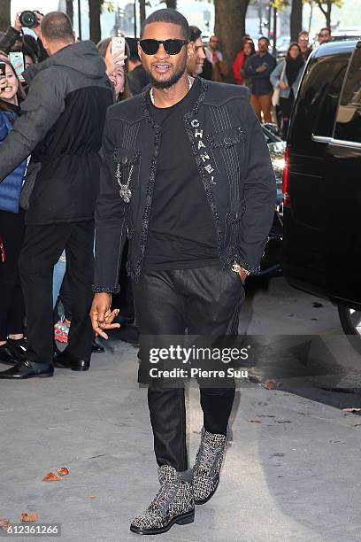 Usher arrives at the Chanel show as part of the Paris Fashion Week Womenswear Spring/Summer 2017 on October 4, 2016 in Paris, France.