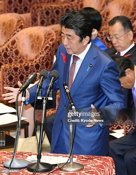 Prime Minister Shinzo Abe attends the House of Representatives' budget committee on Oct. 4 in Tokyo. ==Kyodo