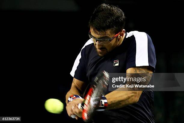 Janko Tipsarevic of Serbia plays a backhand during the men's singles first round match against Taro Daniel of Japan on day two of Rakuten Open 2016...