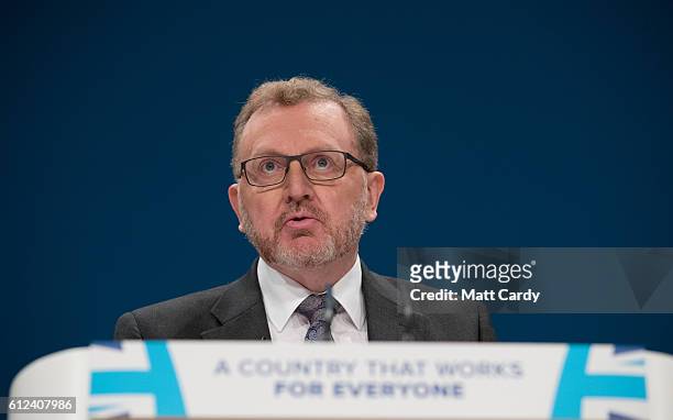 Secretary of State for Scotland David Mundell speaks on stage on the third day of the Conservative Party Conference 2016 at the ICC Birmingham on...