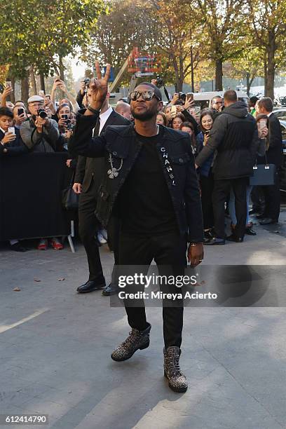 Musician, Usher attends the Chanel show as part of the Paris Fashion Week Womenswear Spring/Summer 2017 on October 4, 2016 in Paris, France.