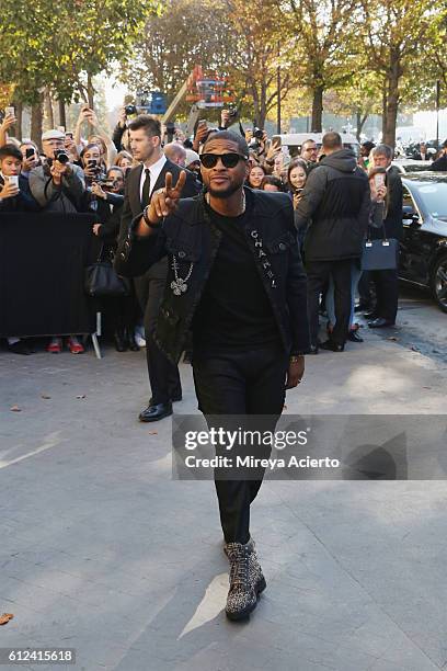 Musician, Usher attends the Chanel show as part of the Paris Fashion Week Womenswear Spring/Summer 2017 on October 4, 2016 in Paris, France.