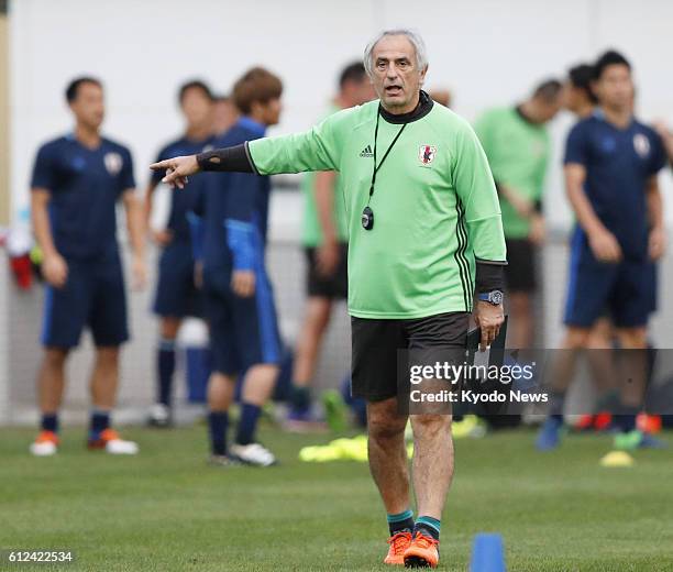 Japan coach Vahid Halilhodzic gives instructions to his players during training in Saitama on Oct. 4 two days before a 2018 World Cup qualifier...