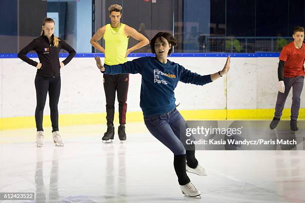 Former ice skating champion Nathalie Pechalat with Justine Scache and Arnaud Caffa are photographed for Paris Match on June 24, 2016 in Paris, France.