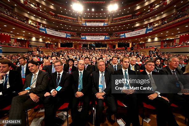 Delegates attend the third day of the Conservative Party Conference 2016 at the ICC Birmingham on October 4, 2016 in Birmingham, England. Ministers...