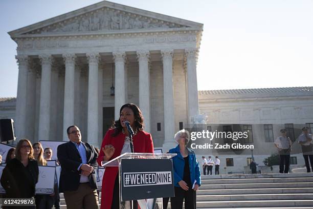 Vice President for Legal Progress at the Center for Americana Progress Michele Jawando speaks during a rally urging the U.S. Senate to hold a...