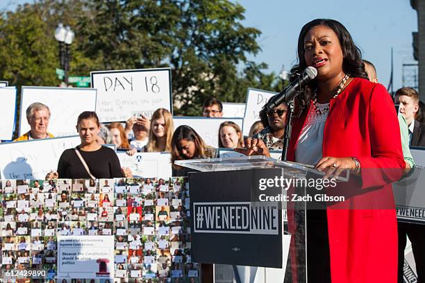 Vice President for Legal Progress at the Center for Americana Progress Michele Jawando speaks during a rally urging the U.S. Senate to hold a...