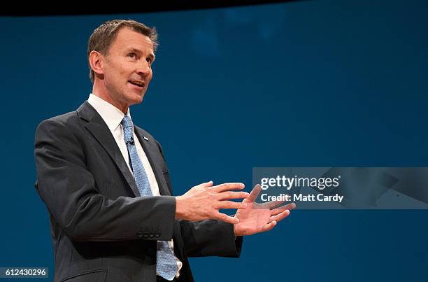 Secretary of State for Health Jeremy Hunt delivers a speech on the third day of the Conservative Party Conference 2016 at the ICC Birmingham on...