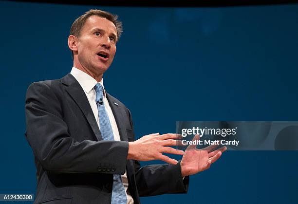 Secretary of State for Health Jeremy Hunt delivers a speech on the third day of the Conservative Party Conference 2016 at the ICC Birmingham on...