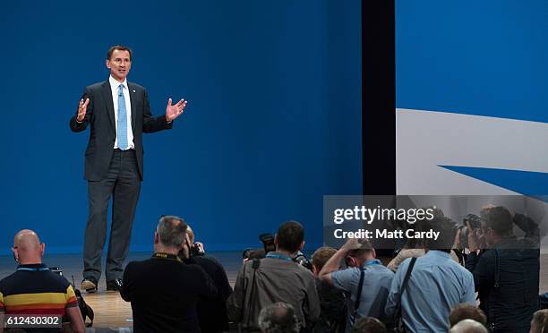 Secretary of State for Health Jeremy Hunt delivers a speech on the third day of the Conservative Party Conference 2016 at the ICC Birmingham on...