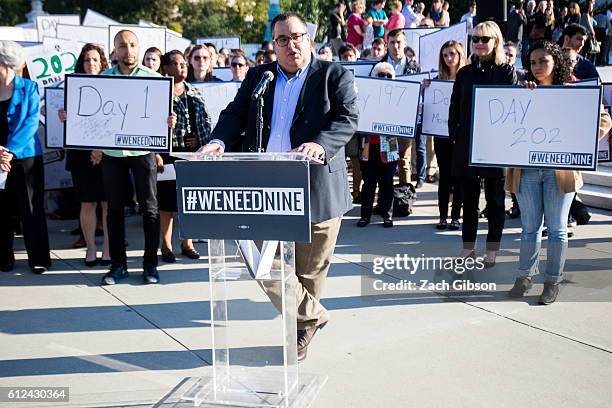 Ross Daniels, a former staffer for Iowa Senator and chairman of the Senate Judiciary Committee Chuck Grassley, speaks during a demonstration urging...