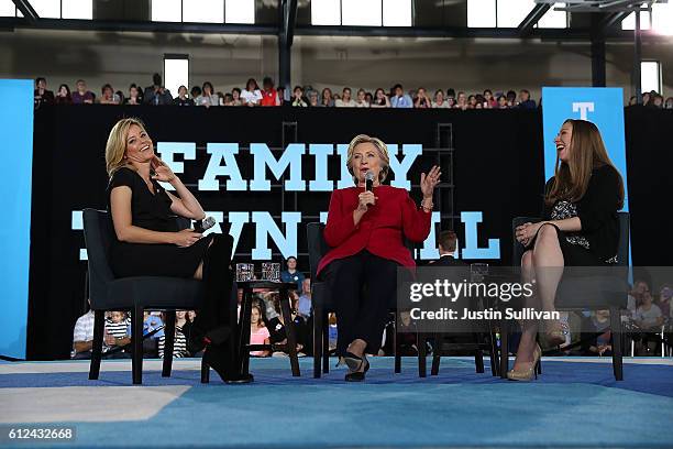Actress Elizabeth Banks, democratic presidential nominee former Secretary of State Hillary Clinton and Chelsea Clinton appear on stage during a...