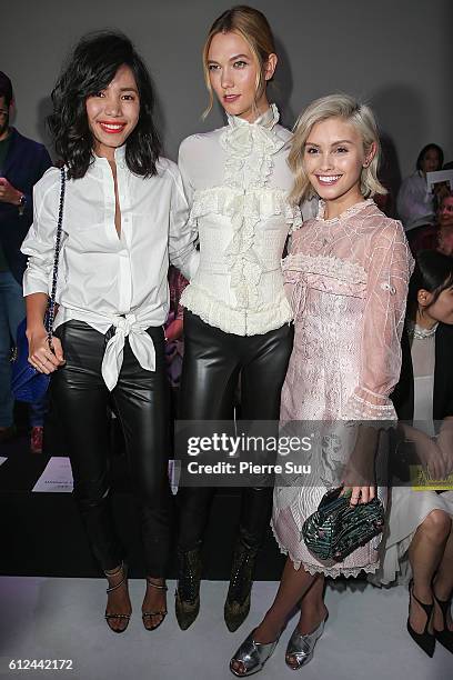 Guest, Karlie Kloss and Sarah Ellen attend the Shiatzy Chen show as part of the Paris Fashion Week Womenswear Spring/Summer 2017 on October 4, 2016...