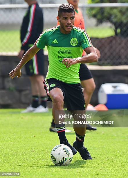 Mexico's football player Jonathan Dos Santos takes part in a training session in Mexico City on October 4, 2016 ahead of the upcoming international...