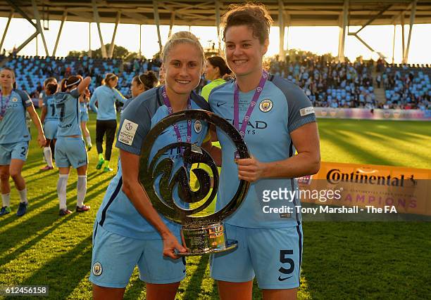 Steph Houghton and Jennifer Beattie of Manchester City Women pose with the Continental Cup Trophy after Manchester City Women win the Continental Cup...