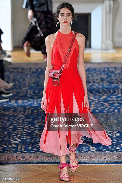Model walks the runway during the Valentino Ready to Wear fashion show as part of the Paris Fashion Week Womenswear Spring/Summer 2017 on October 2,...