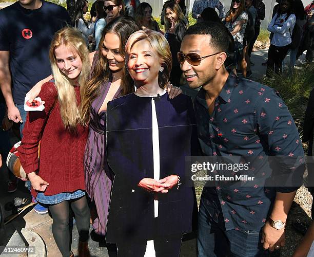 Student Alexandra Olianna poses with model and television personality Chrissy Teigen , singer/songwriter John Legend and a cardboard cutout of...