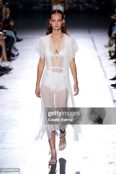 Model walks the runway during the John Galliano designed by Bill Gaytten show as part of the Paris Fashion Week Womenswear Spring/Summer 2017 on...