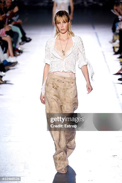 Model walks the runway during the John Galliano designed by Bill Gaytten show as part of the Paris Fashion Week Womenswear Spring/Summer 2017 on...