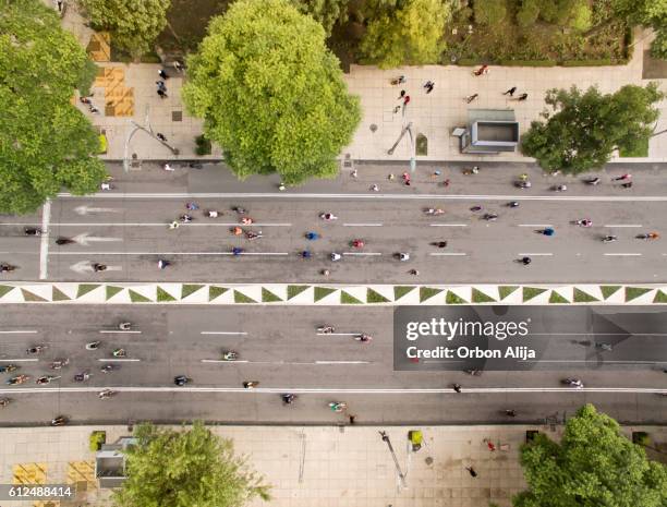 people cycling at the street - cycling drone bildbanksfoton och bilder