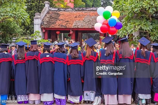 student in gown, graduate ceremony - hanoi stockfoto's en -beelden