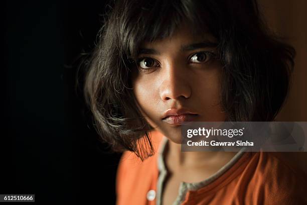 teenage girl looking at camera with blank expression. - indian youth stock pictures, royalty-free photos & images