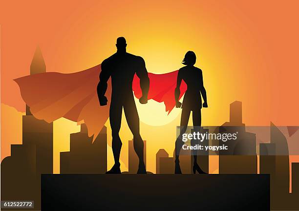 superhero couple silhouette in the city - standing stock illustrations
