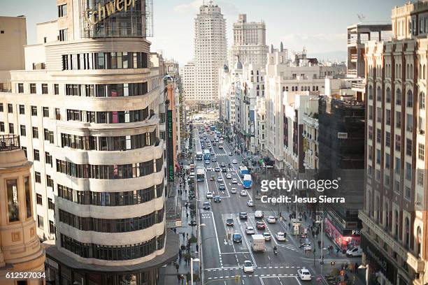 aerial view of gran vía, madrid, spain. - madrid aerial stock pictures, royalty-free photos & images